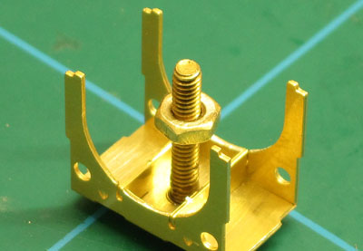 Fitting pivot screw