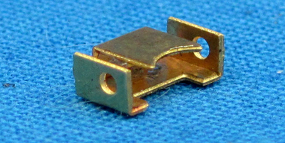 Worm bearing retainer, side folds